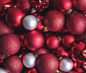 Round Prints: Close up of a variety of red and white Christmas ball ornaments