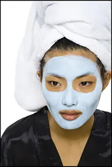 Model Release Prints: Closeup of woman with facial mask and hair towel