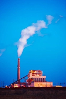 Carbon Prints: Coal burning electricity production facility at dusk