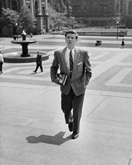 Shirt And Tie Prints: College student walking up steps