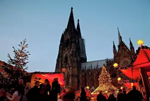 Gothic Prints: Cologne, North Rhine Westphalia, Germany, The Cathedral and the Christmas market beneath