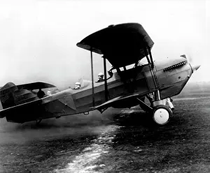 Activist Prints: Colonel Lindbergh takes off for Pacific Coast on Inspection trip - Bride Accompanies him -- Colonel Lindbergh turning
