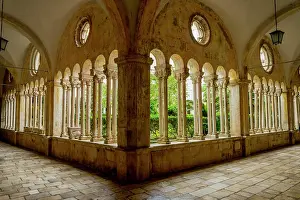 Courtyard Prints: The colonnade of the cloister of the Franciscan Church and Monastery in the old town of Dubrovnik in southern Croatia
