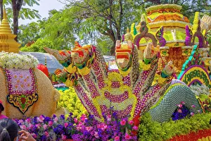 Dragon Prints: Colorful floral floats. 48th Chiang Mai Flower Festival 2025. Thailand