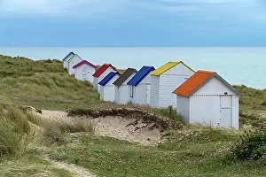 Normandy Prints: Colourful beach houses in the dunes on the beach of Gouville-sur-Mer