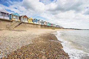 Surf Prints: Colourful beach huts seen from the beach at Southwold on the Suffolk coast