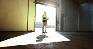 Builder Prints: Construction, warehouse and man on tablet thinking for inspection
