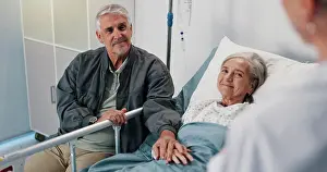 Consultation, doctor and senior couple in hospital