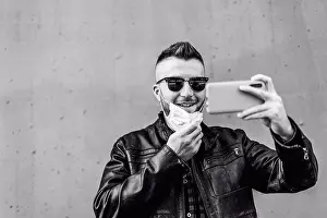 Network Prints: Cool man with big smile wearing open face protective mask during coronavirus outbreak - Smiling hipster man video