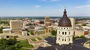 Monument Prints: The copper dome shines in the urban area at the capitol building of Topeka Kansas