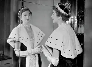 Picture Prints: Coronation Robes Exhibition: A close up of the head and shoulders of a new austerity robe being reflected in a mirror