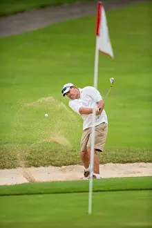 Skilled Prints: Costa Rica, Golfer hitting his ball out of sand trap