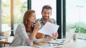Paperwork Prints: Couple, planning budget and finance documents for tax