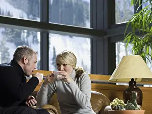 Beverage Prints: Couple sitting together and drinking a hot beverage