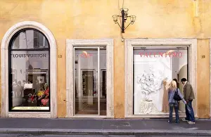 Offer Prints: Couple strolling along Via Condotti, Rome, Italy