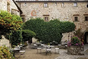 Tuscany Prints: Courtyard filled with tables and chairs