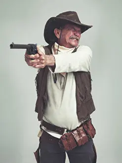 Tough Prints: Cowboy, senior man and shooting gun