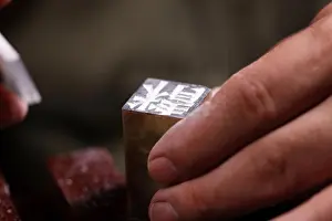 Knife Prints: Craftsman carving Chinese character into a Chinese chop