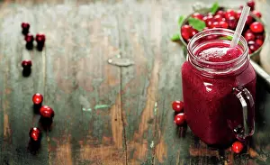 Mixed Prints: Cranberry smoothie on rustic wooden background - Healthy eating, Detox or Diet concept