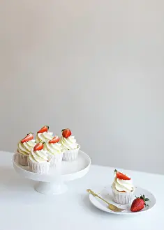 Artisan Prints: cream cupcakes with fresh strawberries freshly prepared by pastry chef