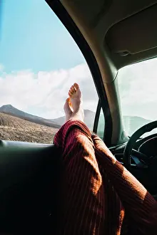 Anonymous Prints: Crop man relaxing in car while traveling