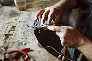 Work Tool Prints: Cropped image of craftsman working in workshop