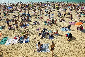 Beaches Prints: Crowded beach with people in August