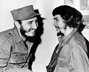 Midadult Men Prints: Cuba: 1959 Cuban Premier Fidel Castro and second in command Ernesto (Che) Guevara share a light hearted moment