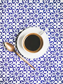 Cafe Prints: Cup of black Turkish or Eastern style coffee over oriental Moroccan patterned background