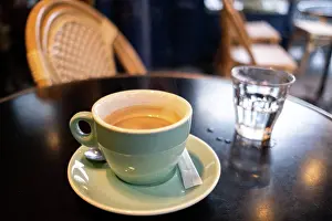 French Woman Prints: A cup of coffee at a cafe. Illustration of tourism and daily life in Greater Paris. France