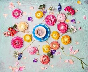 Valentines Prints: Cup of coffee with colorful flowers on turquoise blue shabby chic background