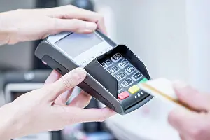 Money Prints: Customer paying by card