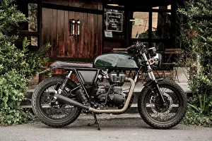 Innovation Prints: customised motorcycle parked in front of custom shop Bangkok