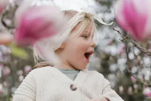 Spring Time Prints: Cute little blonde girl in magnolia flowers