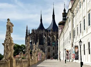 : Czech Republic, Kutna Hora, Baroque Statues and St. Barbara's Cathedral in background