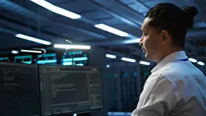 Electronics Prints: Data center system administrator responsible for installation of networking equipment solving tasks