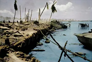 Marines Prints: Dead Bodies in Water and on Beach with onlooking U