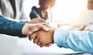 Successful Prints: Deal, handshake and partnership with business people in office together for collaboration closeup