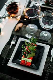 Celebrate Prints: Decorated table for two people for Christmas dinner