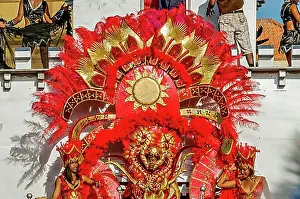 Embellished Prints: Decorated women on pageant waggon. Carnival. Mindelo. Cabo Verde. Africa