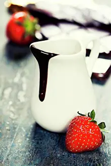 Prepared Prints: Delicious rich and thick chocolate sauce in a jug and assorted chocolates - food and drink