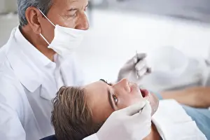 Cleaning Prints: Dental care, man and dentist with tools for healthcare