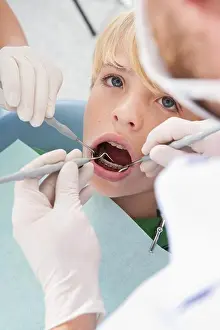 Examination Prints: Dentist and Hygienist checking Boy's Teeth during Appointment, Germany