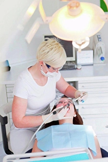 Lighted Prints: Dentist working on patients teeth
