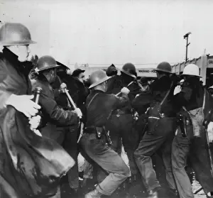 Activist Prints: Deputies Drive Back Film Demonstrators -- Deputy sheriffs
