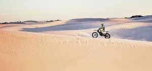 Dubai Prints: Desert, nature and athlete riding a motorcycle for exercise