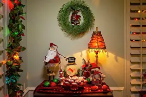 Home Prints: Detail of dining room table decorated for festive Christmas party with cookies and decorations
