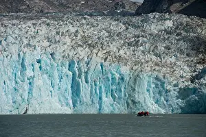 Alaskan Prints: DIP boat with tourists cruising in front of the glacier face of the Dawes Glacier