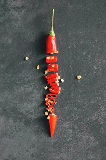 Chili Pepper Prints: Directly above shot of chopped red chili pepper on table