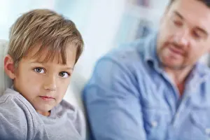 Discipline Prints: Discipline, naughty and portrait of boy with dad on sofa in living room of home for correction or lesson